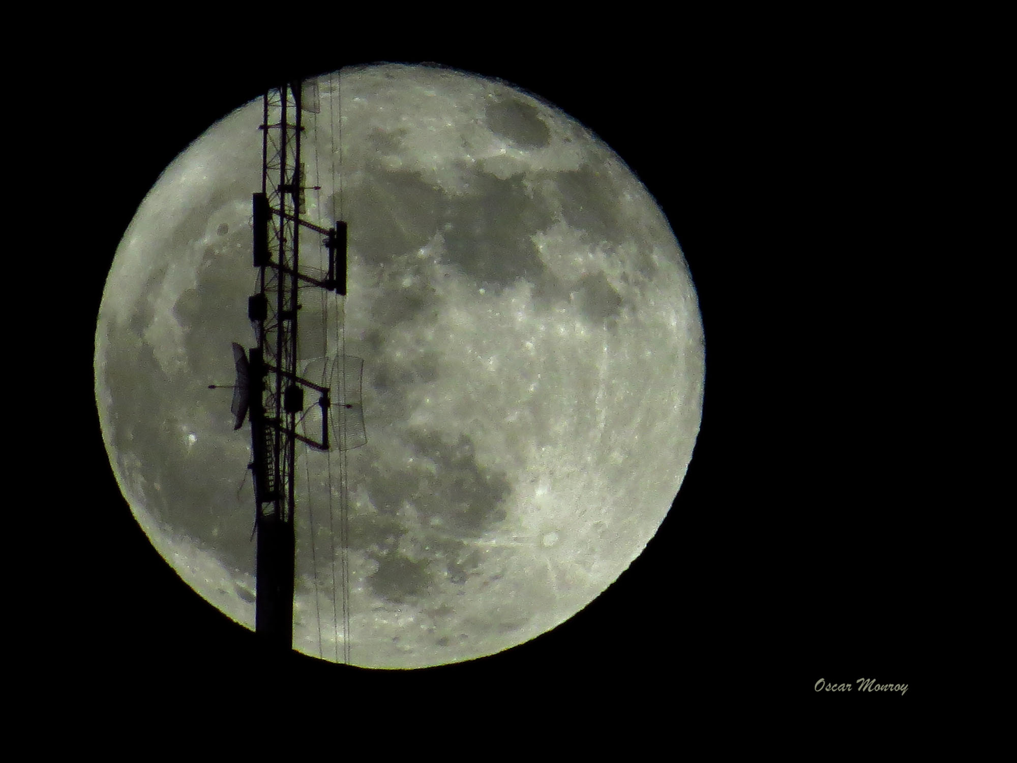 Antenna in front of moon